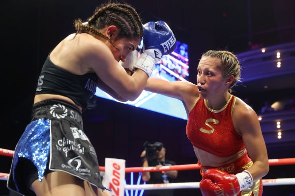 Estrada retains 105-pound belts in close decision
