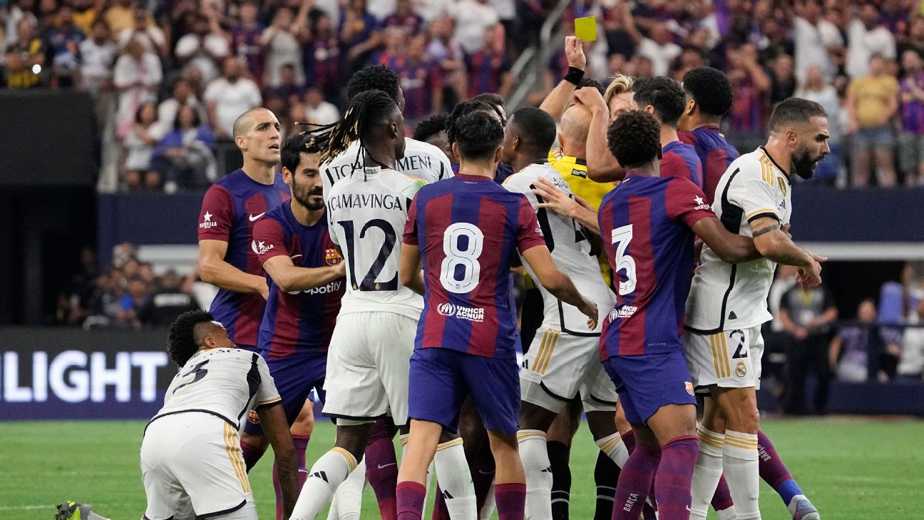 Frenkie de Jong is shown a yellow card during Barcelona's win over Real Madrid in Las Vegas.
