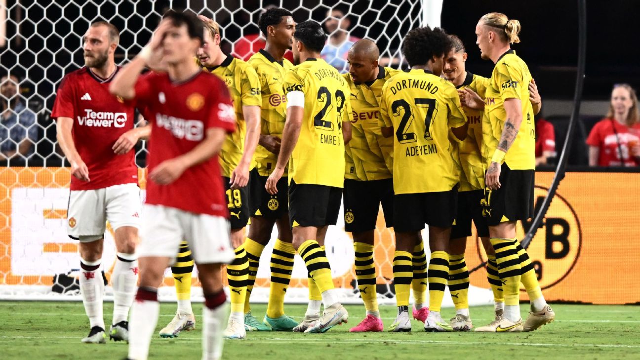 Borussia Dortmund's Donyell Malen scored twice in just over a minute at the end of the first half against Manchester United in Las Vegas.