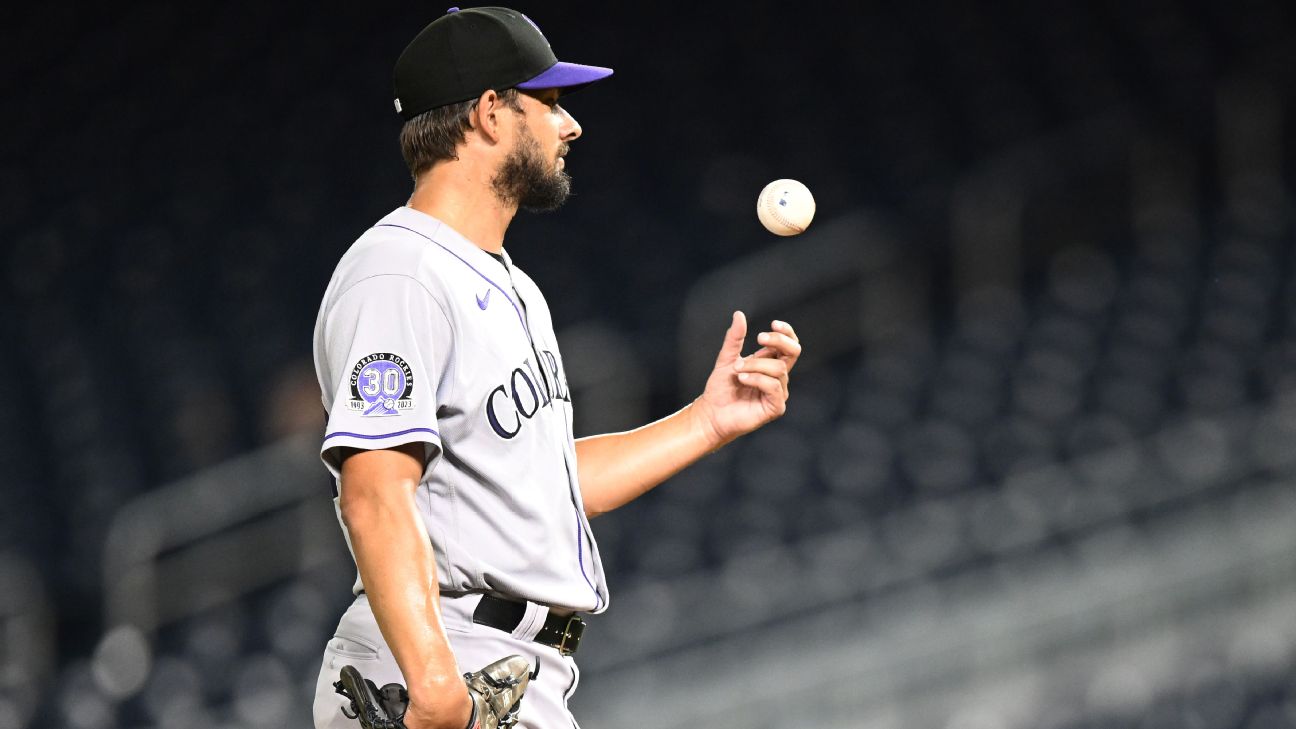 Braves bolster bullpen by acquiring veteran left-hander Hand from Rockies