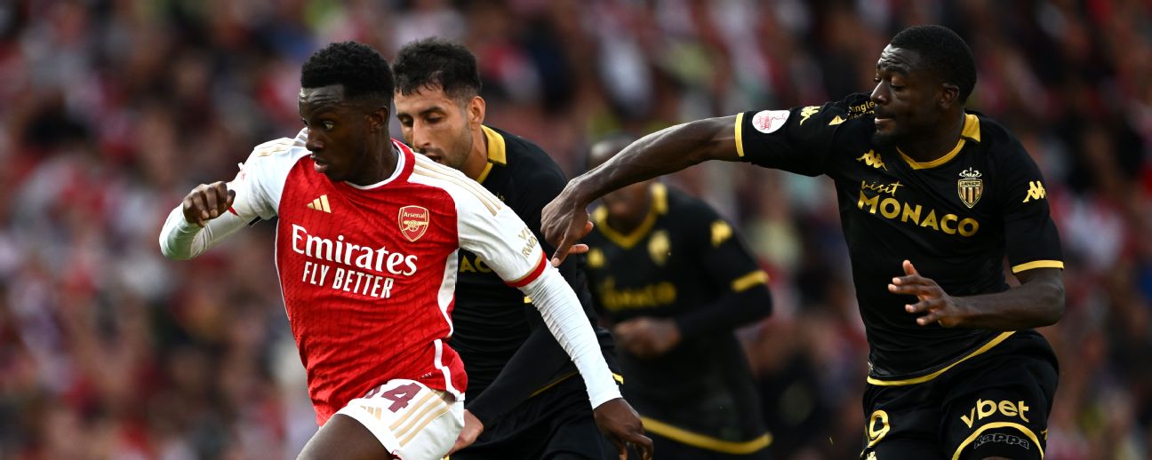 Eddie Nketiah of Arsenal runs with the ball whilst under pressure from Guillermo Maripan and Youssouf Fofana of AS Monaco during the pre-season friendly match between Arsenal FC and AS Monaco at Emirates Stadium on August 02, 2023 in London, England.