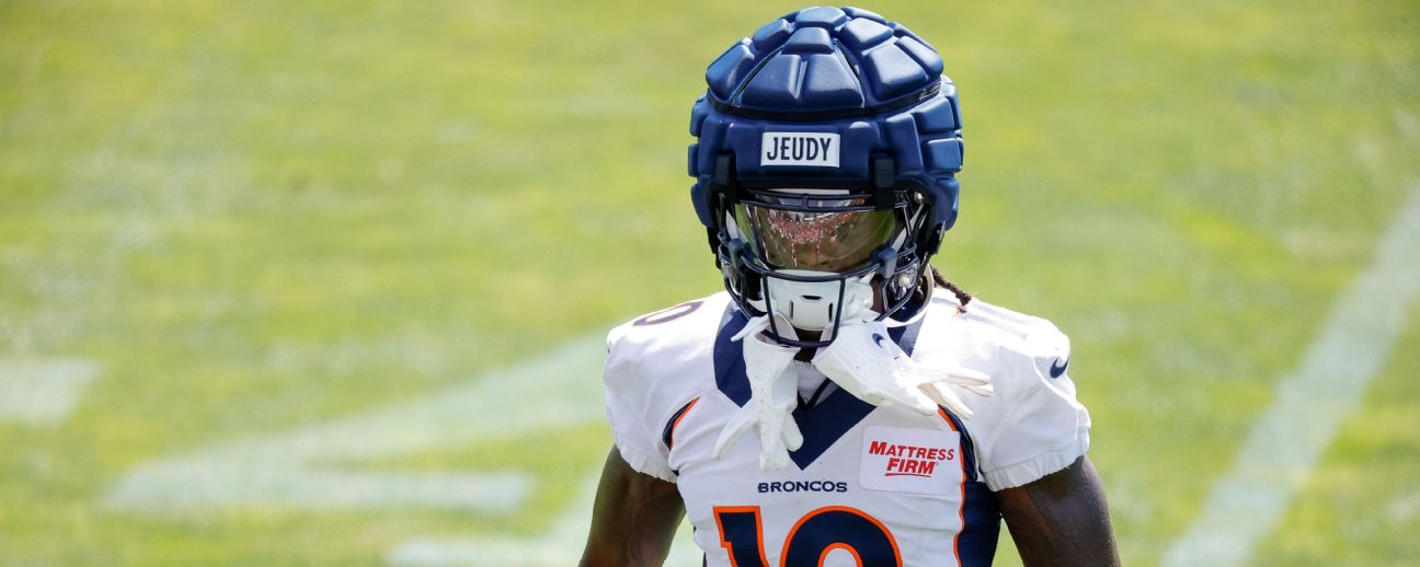 Denver Broncos linebacker Jonathon Cooper , left, and linebacker