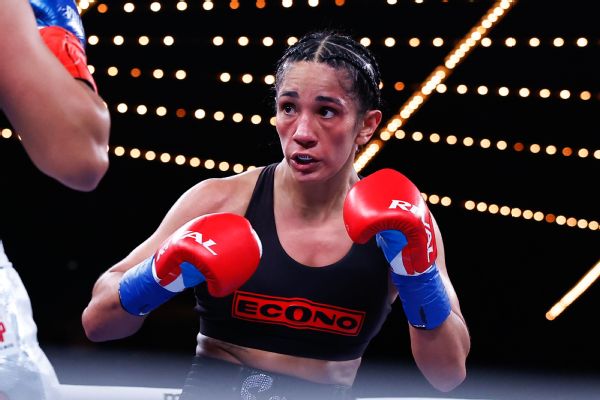 Serrano retains belts in historic 12-round bout