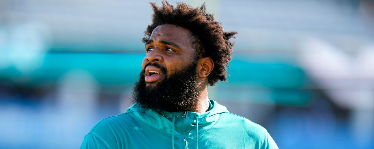 Miami Dolphins defensive tackle Christian Wilkins (94) stands on the  sidelines during an NFL football game against the Houston Texans, Sunday,  Nov. 27, 2022, in Miami Gardens, Fla. (AP Photo/Doug Murray Stock