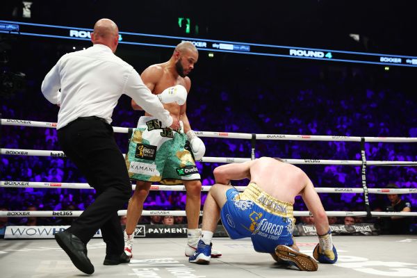 Eubank tastes revenge in dominant TKO of Smith