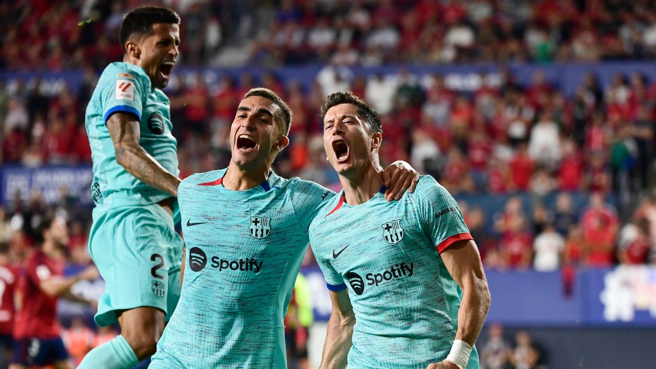 Barcelona players celebrate after scoring the winning goal against Empoli in LaLiga.