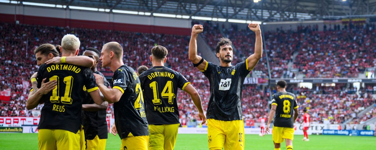 Borussia Dortmund win 4-2 at Freiburg in crazy game - anews