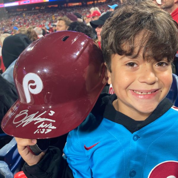 Young fan scores helmet after irate Harper heave
