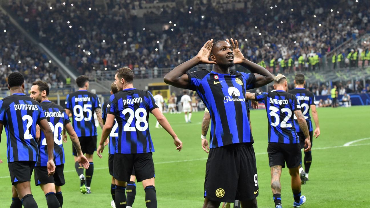 Inter forward Marcus Thuram celebrates after scoring a goal against Benfica in the Champions League.