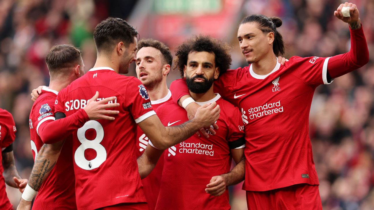 Salah brace sees Liverpool beat 10-man Everton