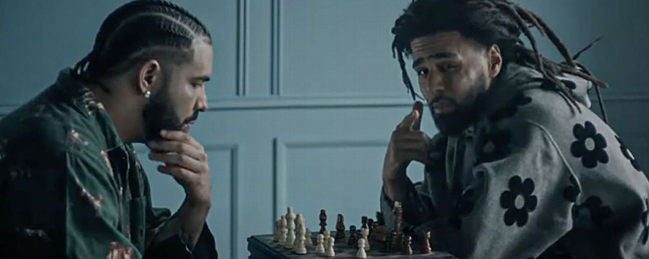 Drake & J. Cole recreated Messi & Ronaldo chess match photo for