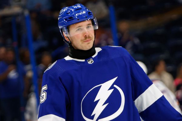 Lightning's Koepke decides to wear neck guard