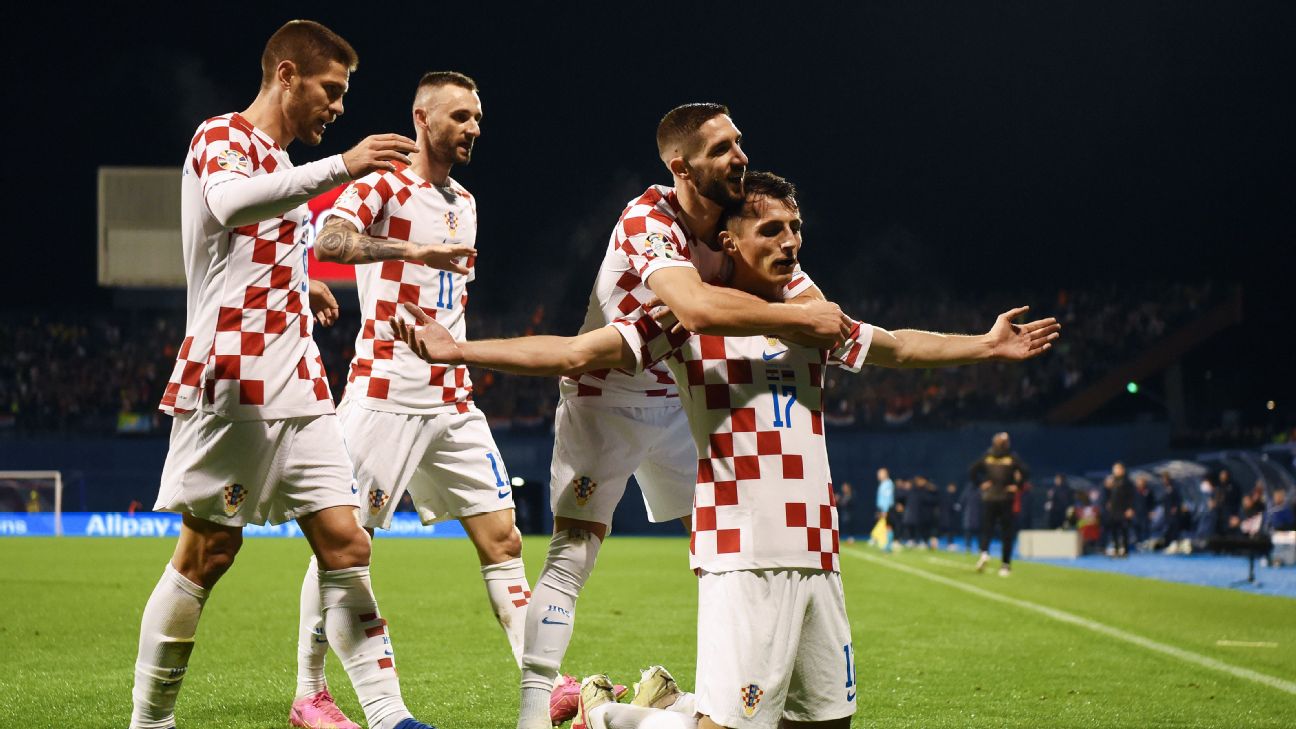 Croatia players celebrate after scoring a goal against Armenia in Euro qualifying.
