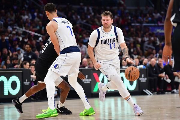 Doncic has thumb sprain but cleared to play