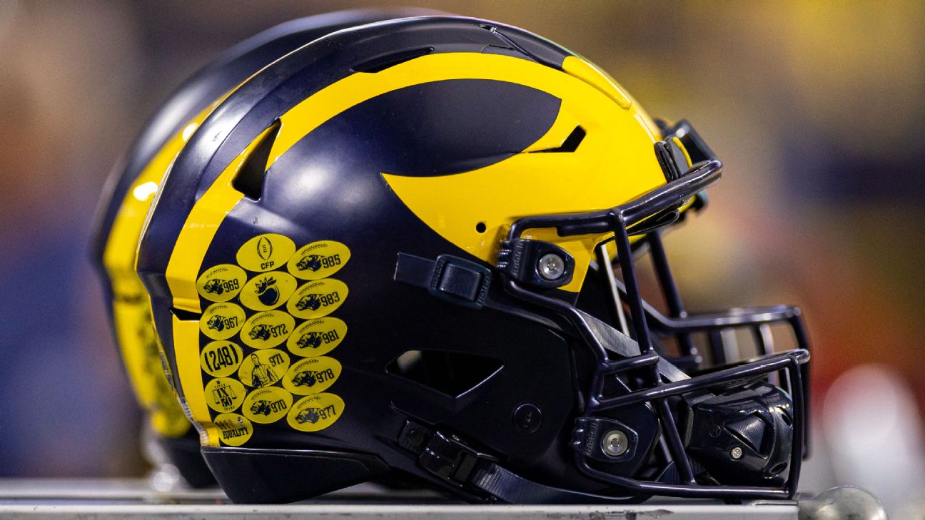 U-M gets probation, fine for recruiting violations