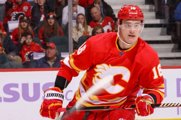 Flames trade Zadorov to Canucks for two picks