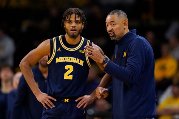 Howard cleared to return as Michigan coach Sat.