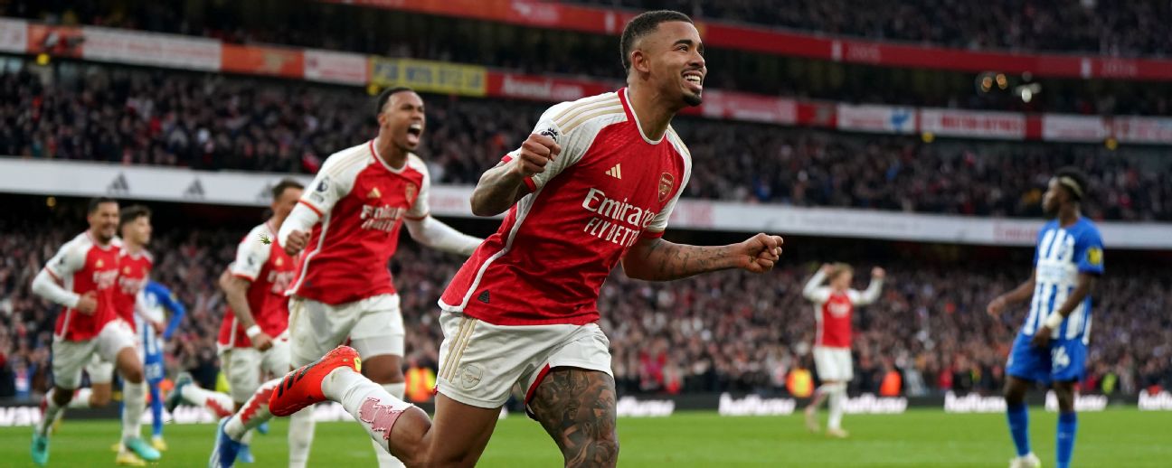 Soccer-Arsenal move top of the league with 2-0 win over Brighton