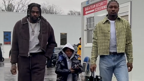 Fashionable family affair: Diggs brothers arrive for Week 15 together