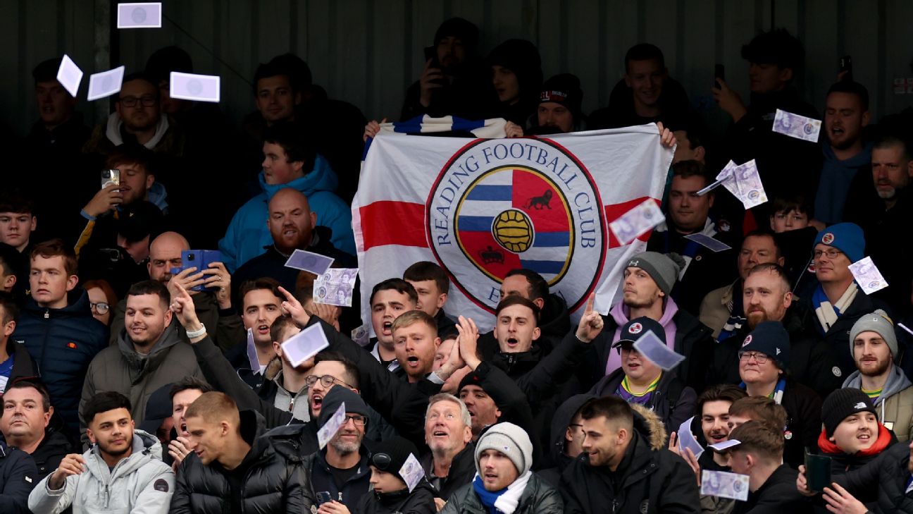 League One game abandoned after pitch invasion