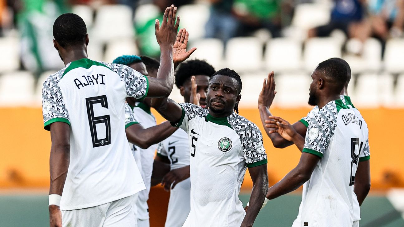 Nigeria players celebrate after taking the lead against Guinea-Bissau at the Africa Cup of Nations.