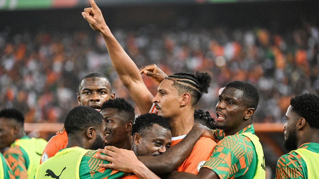 Ivory Coast players celebrate after scoring a goal against Congo DR at the Africa Cup of Nations.