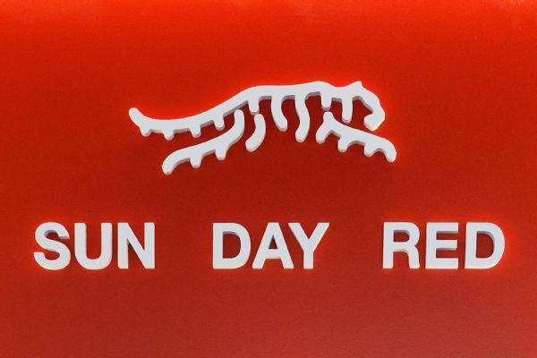 Not just a shirt: Tiger debuts 'Sun Day Red' brand