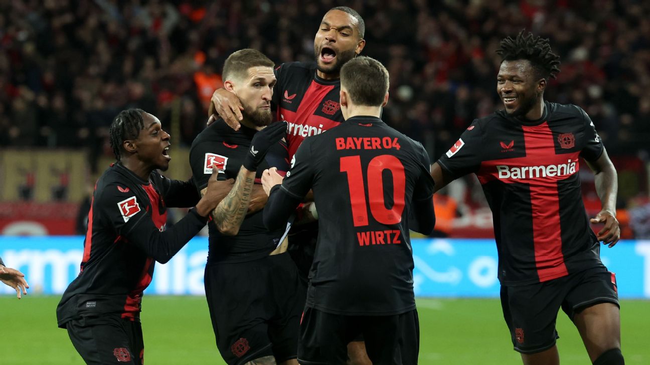 Leverkusen go 11 pts clear, set unbeaten record