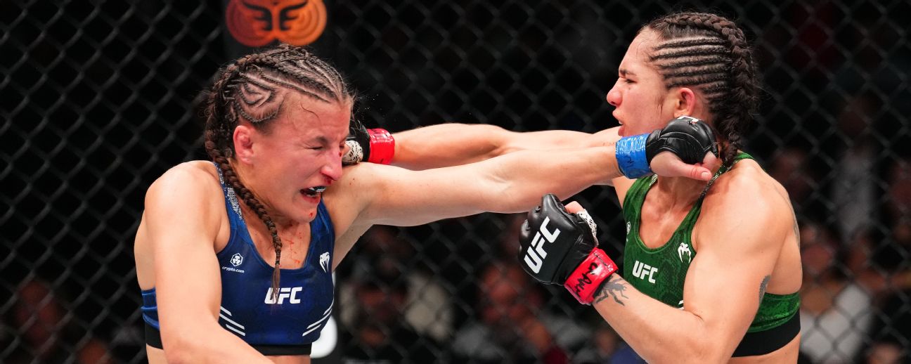 Yazmin Jauregui landing a straight punch on Sam Hughes