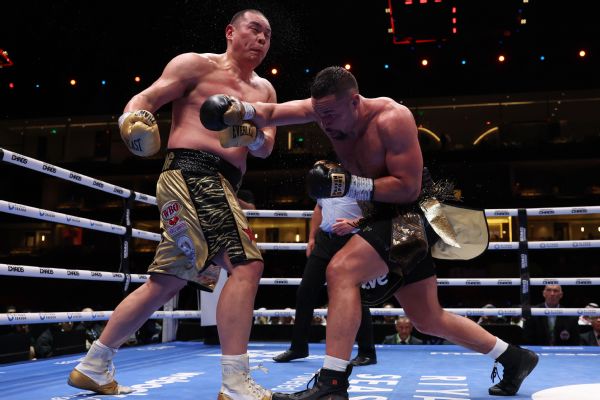 Parker floored twice, tops Zhang in slim decision