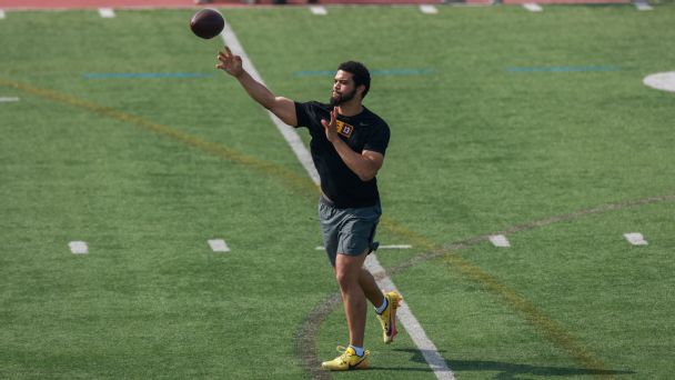 USC Trojans quarterback Caleb Williams performs drills in front of NFL scouts during the USC Pro Day on March 20, 2024, at Loker Stadium in Los Angeles. [608x342]