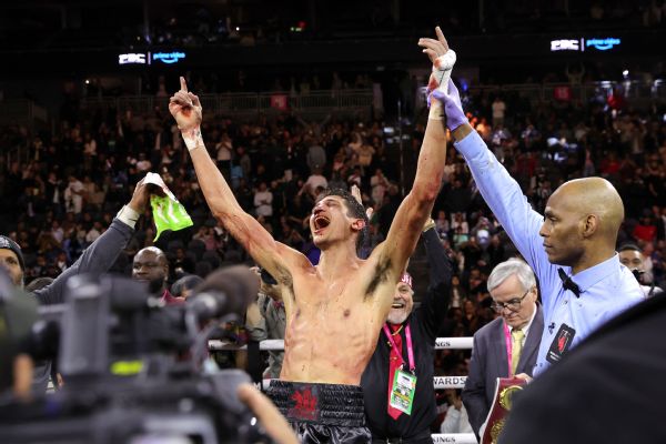 Fundora stuns Tszyu, wins titles by slim decision