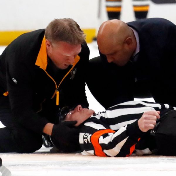 NHL referee collides with Fleury, exits on stretcher