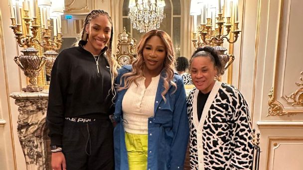 Dawn Staley poses with Serena Williams and A'ja Wilson in Paris