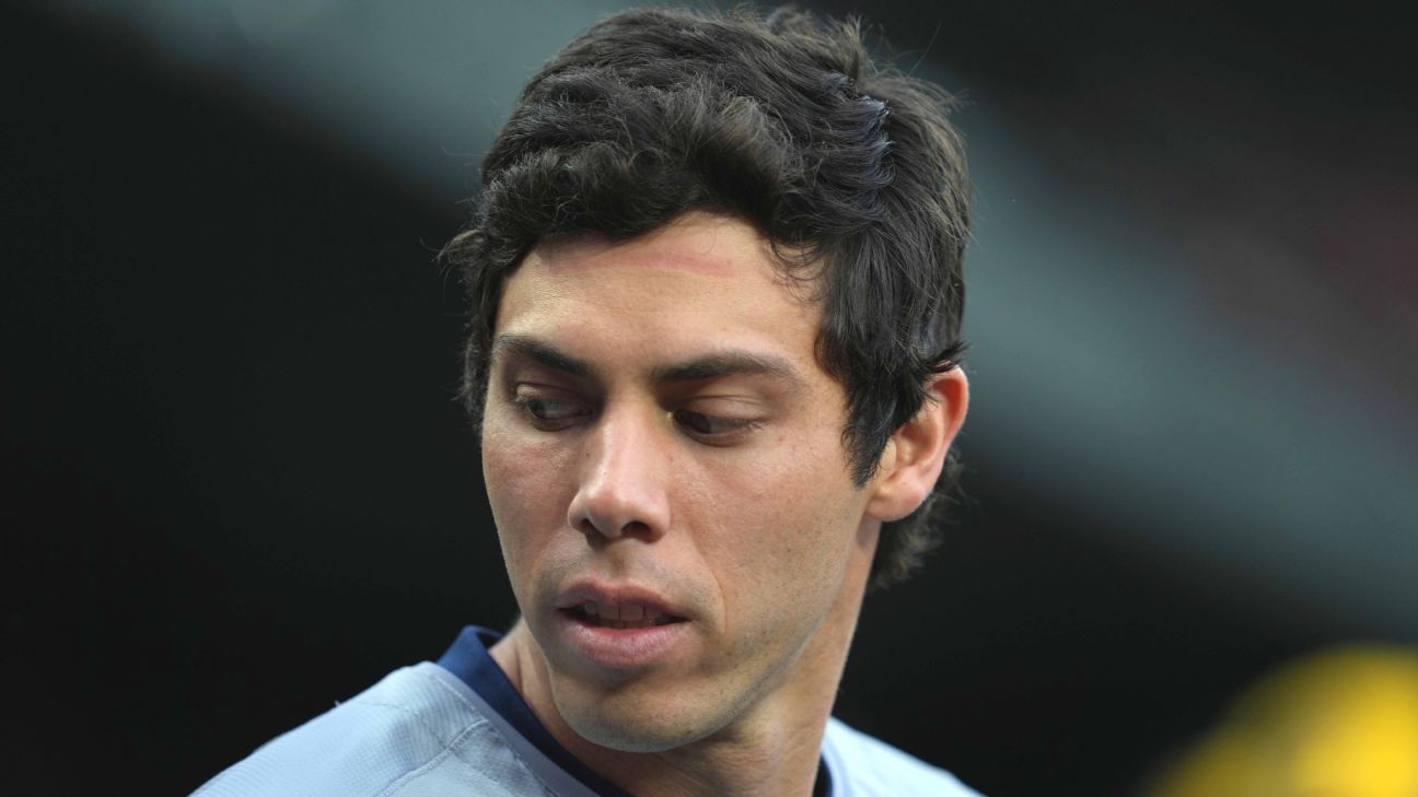 Christian Yelich Sidelined with Back Injury as Brewers Face Phillies in Crucial Series