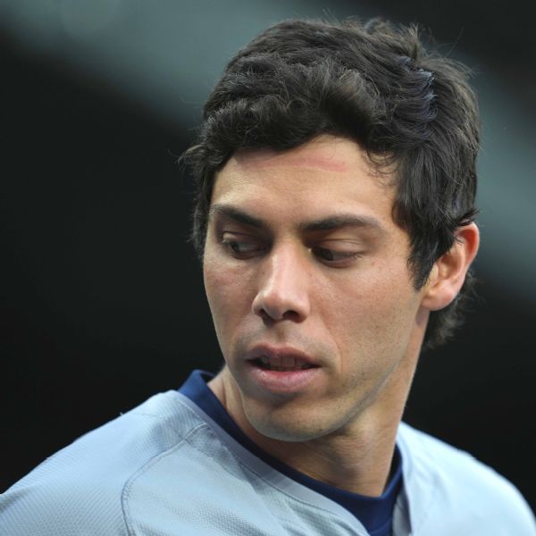 Brewers send Yelich to IL due to strained back