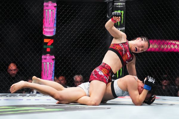 Zhang holds on to overcome Yan via decision