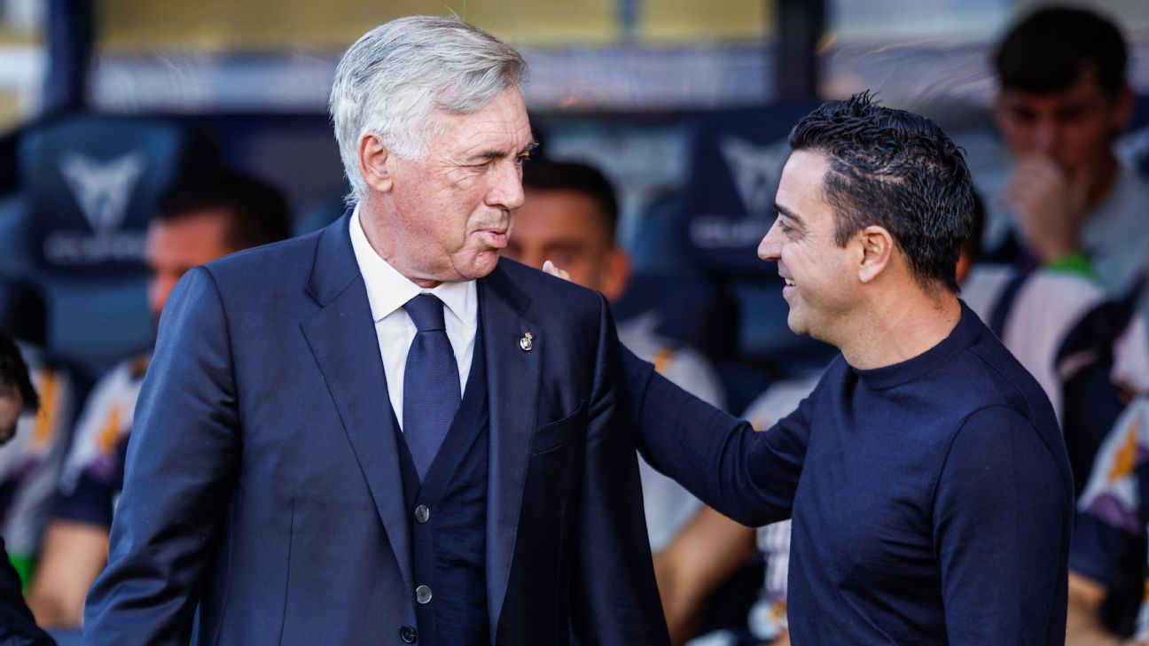 Coach Carlo Ancelotti of Real Madrid and Xavi Hernandez coach of FC Barcelona during the La Liga 