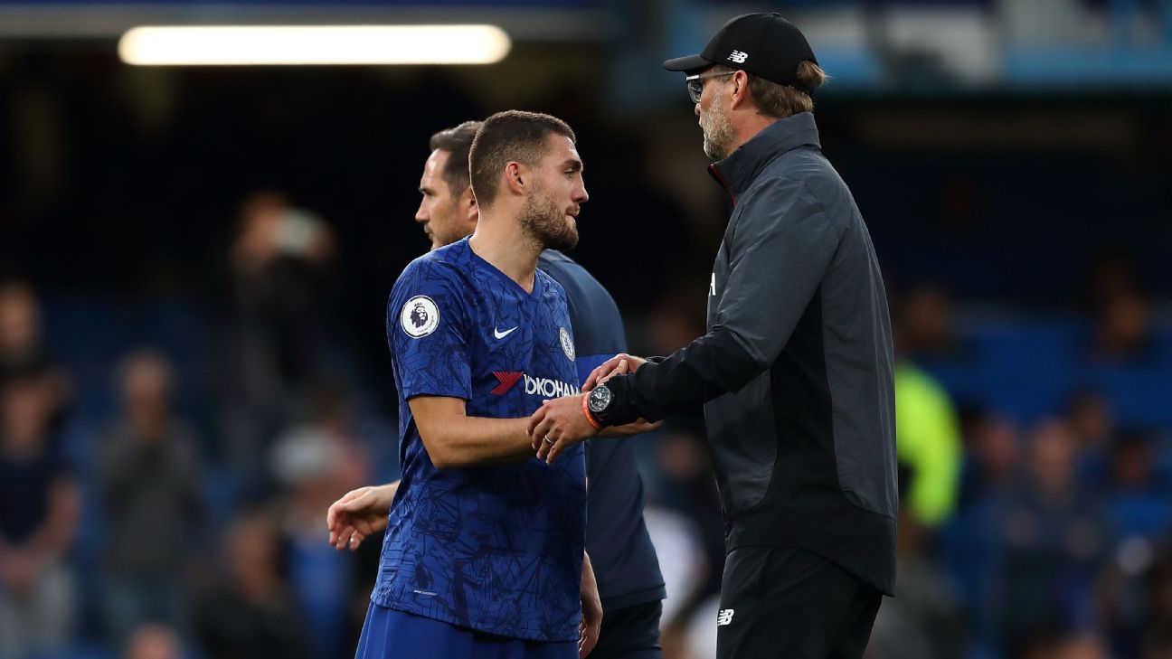 Mateo Kovacic of Chelsea at full time with Liverpool manager / head coach Juergen Klopp at the Premier League match between Chelsea FC and Liverpool FC  [1296x729]