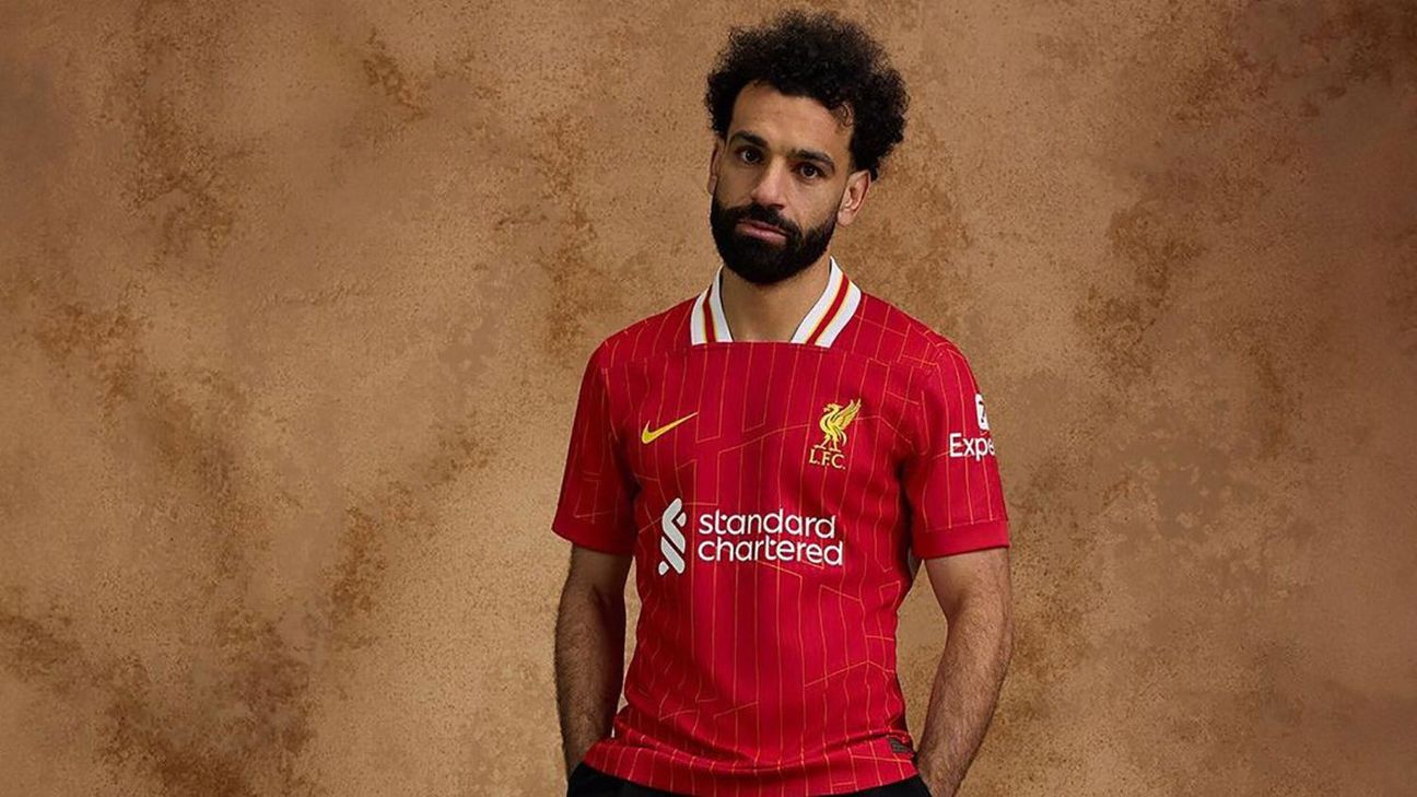 Mohamed Salah models Liverpool's 2024-25 home kit [1296x729]