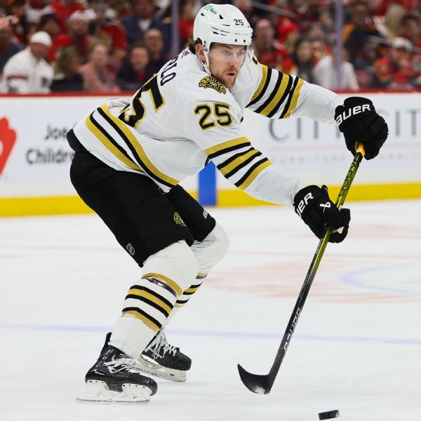 Carlo rejoins Bruins late, scores after son is born