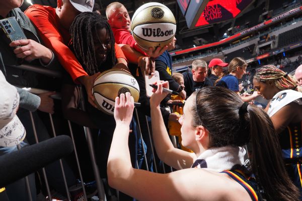 Raucous crowd watches Fever's Caitlin Clark win home debut