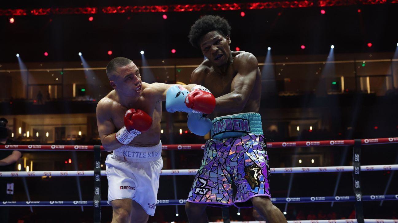 Ball edges past Ford to claim first world title