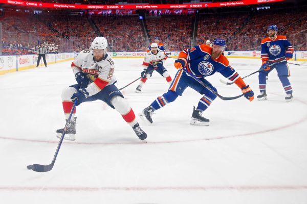 Florida Panthers at Edmonton Oilers (Aleksander Barkov #16 of the Florida Panthers gathers the puck in front of Mattias Ekholm #14 of the Edmonton Oilers) [600x400]