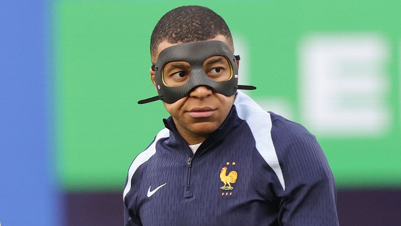Kylian Mbappe France warmup in mask [1296x729]