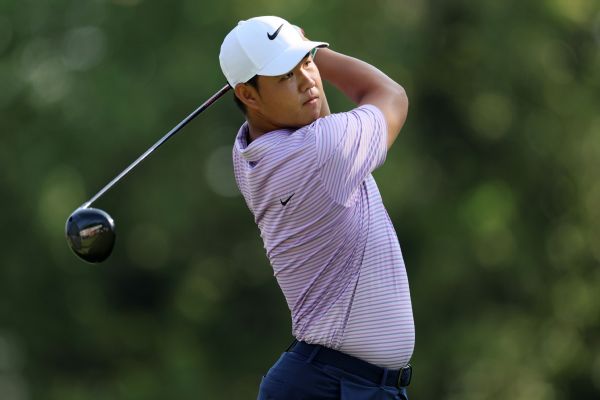 T. Kim shoots 65, maintains lead at Travelers