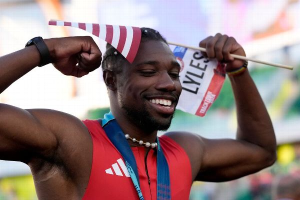 Lyles wins 100m race at trials for Olympic berth
