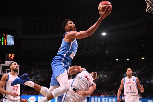 Giannis, Greece open with rout; Slovenia's Olympic bid still alive
