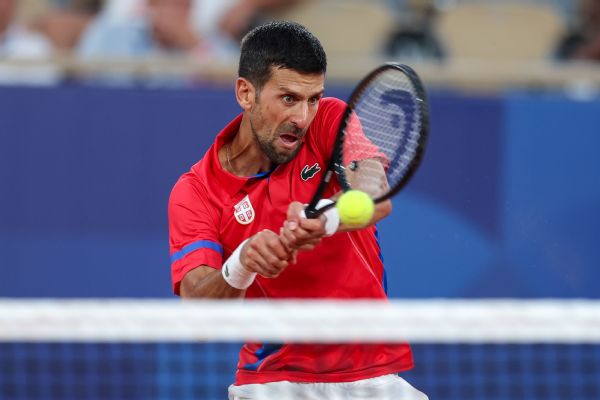 Djokovic beats Tsitsipas but worried about knee
