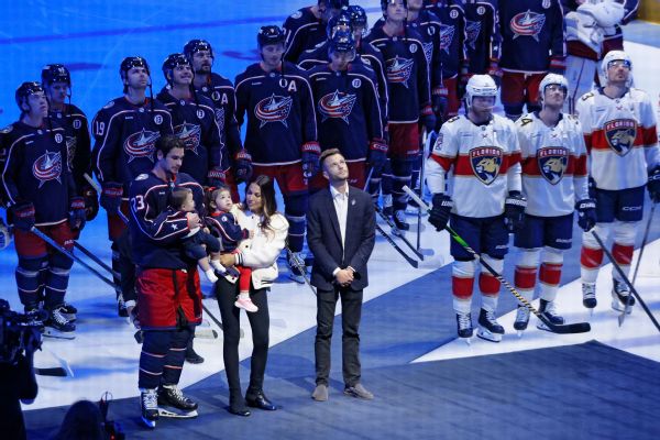 Johnny Gaudreau's family watches a #13 banner being raised [600x400]